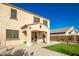 Two-story house with a covered patio and a well-manicured lawn at 9567 W Robin Ln, Peoria, AZ 85383