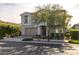 Two-story house with a two-car garage and landscaping at 10129 E Strobe Ave, Mesa, AZ 85212