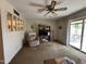 Living room with a view of the patio and a cozy seating area at 1131 S St Paul --, Mesa, AZ 85206