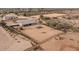 Aerial view of a home with a large fenced backyard at 12121 S 214Th Ave, Buckeye, AZ 85326