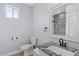 Small bathroom with granite countertop and a walk-in shower at 12121 S 214Th Ave, Buckeye, AZ 85326