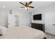 Bright bedroom with a large bed and plenty of closet space at 12121 S 214Th Ave, Buckeye, AZ 85326