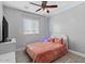 Cozy bedroom with a comfortable bed and accent lighting at 12121 S 214Th Ave, Buckeye, AZ 85326