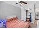 Bedroom with a queen bed and en-suite bathroom access at 12121 S 214Th Ave, Buckeye, AZ 85326