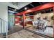 Kitchen and dining area with dark wood cabinets and granite countertops at 13610 S 41St Pl, Phoenix, AZ 85044