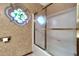 Bathroom with shower/tub combo and decorative stained glass window at 15205 E Palomino Blvd, Fountain Hills, AZ 85268