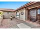 Front entrance with ornate wooden door and brick accents at 15205 E Palomino Blvd, Fountain Hills, AZ 85268