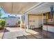 Covered patio, storage shed, and spacious backyard at 17200 W Bell Rd # 64, Surprise, AZ 85374