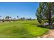 Golf course community with lush landscaping at 17200 W Bell Rd # 64, Surprise, AZ 85374