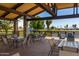 Community patio area with tables and chairs at 17200 W Bell Rd # 64, Surprise, AZ 85374