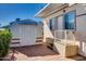 Home exterior with storage shed and patio at 17200 W Bell Rd # 64, Surprise, AZ 85374