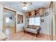 Small office or den with built in shelves and a comfortable couch at 17200 W Bell Rd # 64, Surprise, AZ 85374