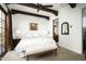 Bright bedroom with king-size bed, and ensuite bathroom access at 19501 N 101St St, Scottsdale, AZ 85255