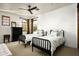 Charming bedroom with two twin beds, a dresser, and window with curtains at 19501 N 101St St, Scottsdale, AZ 85255
