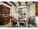 Charming dining room with antique buffet and hardwood floors at 19501 N 101St St, Scottsdale, AZ 85255