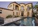 Stunning two-story home with a pool and beautifully landscaped grounds at 19501 N 101St St, Scottsdale, AZ 85255