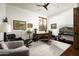 Bright home office with built-in desk and ample natural light at 19501 N 101St St, Scottsdale, AZ 85255