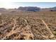 Desert lot near a paved road, showing surrounding landscape at 1 N Brenner Pass Rd, Queen Creek, AZ 85144