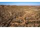 Aerial view of a desert lot with a paved road at 1 N Brenner Pass Rd, Queen Creek, AZ 85144