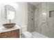 Modern bathroom with marble-look shower and vessel sink at 26611 S 187Th Ave, Buckeye, AZ 85326