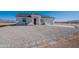 New construction home with gravel driveway at 26623 S 187Th Ave, Buckeye, AZ 85326