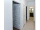 Hallway with doors to bedrooms and bathrooms at 3372 W Stanton Ave, Apache Junction, AZ 85120