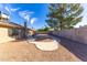 Large backyard with gravel and a concrete pathway at 3953 W Evans Dr, Phoenix, AZ 85053