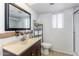 Clean bathroom with a shower/tub combo and updated vanity at 3953 W Evans Dr, Phoenix, AZ 85053