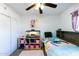 bedroom with twin bed, shelving, and playful decor at 3953 W Evans Dr, Phoenix, AZ 85053