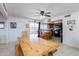 Rustic dining room with a large wooden table and bench seating at 3953 W Evans Dr, Phoenix, AZ 85053
