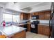 Modern kitchen with an island and stainless steel appliances at 3953 W Evans Dr, Phoenix, AZ 85053