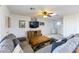 Spacious living room with sectional sofa and large TV at 3953 W Evans Dr, Phoenix, AZ 85053