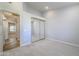 Bedroom with mirrored closet doors and access to hallway at 4226 E Everett Dr, Phoenix, AZ 85032