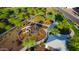 Community park with playground and shaded seating area at 4923 E Village Dr, Scottsdale, AZ 85254