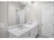 Modern bathroom with double vanity and large mirror at 4923 E Village Dr, Scottsdale, AZ 85254