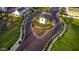 Community entrance with landscaping at 4923 E Village Dr, Scottsdale, AZ 85254