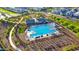 Community pool with surrounding landscaping at 4923 E Village Dr, Scottsdale, AZ 85254