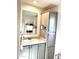 Bathroom with vanity, large mirror and storage cabinets at 701 S Dobson Rd # 158, Mesa, AZ 85202