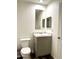 Bathroom with vanity, toilet, and mirrored medicine cabinet at 701 S Dobson Rd # 158, Mesa, AZ 85202