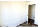 Simple bedroom with wood-look floors and an additional room at 701 S Dobson Rd # 158, Mesa, AZ 85202