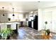 Modern kitchen with gray cabinets, island, and stainless steel appliances at 701 S Dobson Rd # 158, Mesa, AZ 85202