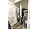 Mechanical room with water heater and HVAC unit at 701 S Dobson Rd # 158, Mesa, AZ 85202