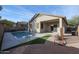 Inviting backyard oasis with a refreshing pool and patio at 8575 W Maya Dr, Peoria, AZ 85383