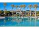 Community pool with clubhouse in background at 9412 S 181St Ave, Goodyear, AZ 85338