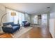 Cozy living room with two armchairs and a floor lamp at 1719 W Highland Ave, Phoenix, AZ 85015