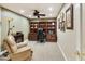 Home office with built-in desk and ample shelving at 24414 S Lakeway Sw Cir, Sun Lakes, AZ 85248