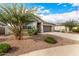 New construction home with a two-car garage and nicely landscaped yard at 24686 N 184Th Ln, Wittmann, AZ 85361