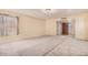 Living room with carpet and entryway view at 24906 W Boone Dr, Casa Grande, AZ 85193