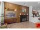 Living room with fireplace and built-in media console at 3440 N Boulder Ct, Buckeye, AZ 85396