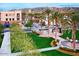 Scenic town square with palm trees and shops at 3440 N Boulder Ct, Buckeye, AZ 85396